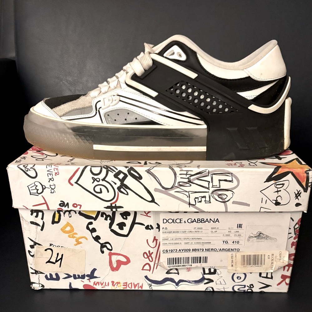 Dolce & Gabanna
Men’s size 8
White, black, and grey